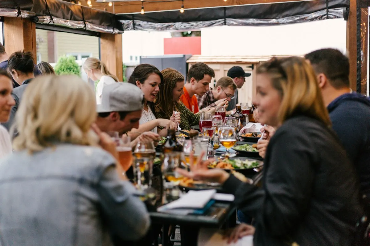 People collaborating around a restaurant table