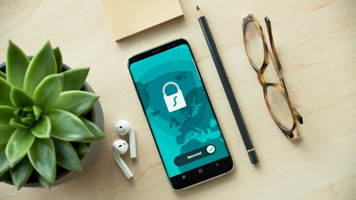 Smartphone with a visible lock icon on a desk