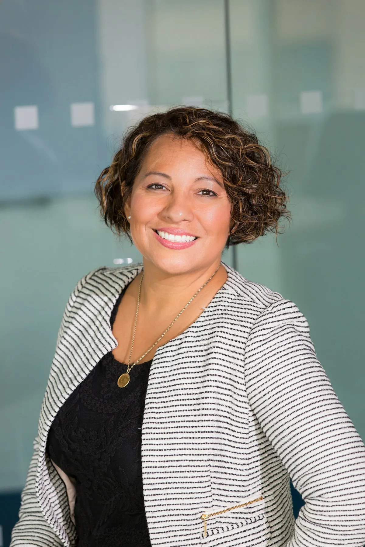 Professional woman seated in a business portrait
